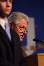 Former President Bill Clinton hands out commitment certificates to CGIU attendees for their exceptional pledges to the CGI cause during the opening plenary session of the CGIU meeting.  Day one of the 2nd Annual Clinton Global Initiative University (CGIU) meeting was held at The University of Texas at Austin, Friday, February 13, 2009.

Filename: SRM_20090213_16462313.jpg
Aperture: f/2.8
Shutter Speed: 1/400
Body: Canon EOS 20D
Lens: Canon EF 300mm f/2.8 L IS