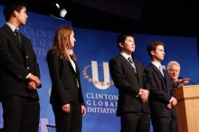 Former President Bill Clinton hands out commitment certificates to CGIU attendees for their exceptional pledges to the CGI cause during the opening plenary session of the CGIU meeting.  Day one of the 2nd Annual Clinton Global Initiative University (CGIU) meeting was held at The University of Texas at Austin, Friday, February 13, 2009.

Filename: SRM_20090213_16470922.jpg
Aperture: f/4.0
Shutter Speed: 1/100
Body: Canon EOS-1D Mark II
Lens: Canon EF 80-200mm f/2.8 L