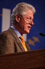 Former President Bill Clinton hands out commitment certificates to CGIU attendees for their exceptional pledges to the CGI cause during the opening plenary session of the CGIU meeting.  Day one of the 2nd Annual Clinton Global Initiative University (CGIU) meeting was held at The University of Texas at Austin, Friday, February 13, 2009.

Filename: SRM_20090213_16495423.jpg
Aperture: f/2.8
Shutter Speed: 1/250
Body: Canon EOS 20D
Lens: Canon EF 300mm f/2.8 L IS