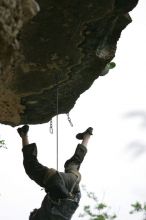 Someone taking a big fall on Cuttin Cards for a Poke (5.12+).  It was another long day of rock climbing at Seismic Wall on Austin's Barton Creek Greenbelt, Saturday, April 11, 2009.

Filename: SRM_20090411_13314958.JPG
Aperture: f/4.0
Shutter Speed: 1/1000
Body: Canon EOS-1D Mark II
Lens: Canon EF 80-200mm f/2.8 L