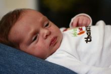 Baby Maddox Helbing, 3 weeks old, at Lake Oconee on Thursday, November 26, 2009.

Filename: SRM_20091126_13450505.JPG
Aperture: f/2.0
Shutter Speed: 1/60
Body: Canon EOS 20D
Lens: Canon EF 50mm f/1.8 II