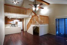 Entry into the great room, with vaulted ceilings. Stairs lead up to the loft and master bedroom suite. Bamboo floors throughout the first floor.

Filename: SRM_20101228_17420336.JPG
Aperture: f/2.8
Shutter Speed: 1/50
Body: Canon EOS-1D Mark II
Lens: Canon EF 16-35mm f/2.8 L