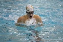 Ryan Bishop placed 3rd in the men's 200 yd medley against UVA

Filename: crw_3714_std.jpg
Aperture: f/2.8
Shutter Speed: 1/500
Body: Canon EOS DIGITAL REBEL
Lens: Canon EF 80-200mm f/2.8 L