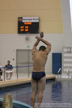 Diver Pete Doblar competes against the University of Tennessee.

Filename: crw_2160_std.jpg
Aperture: f/2.8
Shutter Speed: 1/500
Body: Canon EOS DIGITAL REBEL
Lens: Canon EF 80-200mm f/2.8 L