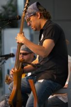 The Gene Pool, performing at the Austin airport.  Geno Stroia II on vocals/guitar, Jorge Castillo on vocals/guitar, Travis Woodard on drums and Steven Ray Will on vocals/bass guitar.

Filename: SRM_20060518_154746_6.jpg
Aperture: f/2.8
Shutter Speed: 1/200
Body: Canon EOS 20D
Lens: Canon EF 80-200mm f/2.8 L