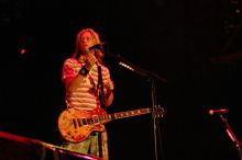 Puddle of Mudd performs on the first day of Music Midtown, 2004.

Filename: IMG_6061.jpg
Aperture: f/2.8
Shutter Speed: 1/160
Body: Canon EOS DIGITAL REBEL
Lens: Canon EF 80-200mm f/2.8 L