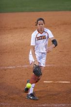 Cat Osterman pitching to the Mean Green.  The Lady Longhorns beat the University of North Texas 5-0 in the first game of the double header Wednesday night.

Filename: SRM_20060308_212228_8.jpg
Aperture: f/2.8
Shutter Speed: 1/1000
Body: Canon EOS 20D
Lens: Canon EF 80-200mm f/2.8 L