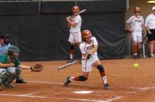 #44, Desiree Williams, hit a home run against the Mean Green.  The Lady Longhorns beat the University of North Texas 5-0 in the first game of the double header Wednesday night.

Filename: SRM_20060308_205125_6.jpg
Aperture: f/4.5
Shutter Speed: 1/500
Body: Canon EOS 20D
Lens: Canon EF 80-200mm f/2.8 L