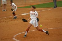 Cat Osterman pitching to the Mean Green.  The Lady Longhorns beat the University of North Texas 5-0 in the first game of the double header Wednesday night.

Filename: SRM_20060308_204359_6.jpg
Aperture: f/2.8
Shutter Speed: 1/2500
Body: Canon EOS 20D
Lens: Canon EF 80-200mm f/2.8 L