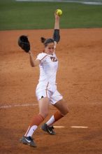 Cat Osterman pitching to the Mean Green.  The Lady Longhorns beat the University of North Texas 5-0 in the first game of the double header Wednesday night.

Filename: SRM_20060308_212034_0.jpg
Aperture: f/2.8
Shutter Speed: 1/1000
Body: Canon EOS 20D
Lens: Canon EF 80-200mm f/2.8 L