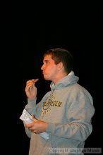 Cookie Eating contest in between acts at the Mock Rock competition at the Ferst Center.  The male student in gray and the female student in navy blue were the winners.                                                                                        

Filename: img_1768_std.jpg
Aperture: f/2.8
Shutter Speed: 1/160
Body: Canon EOS DIGITAL REBEL
Lens: Canon EF 80-200mm f/2.8 L