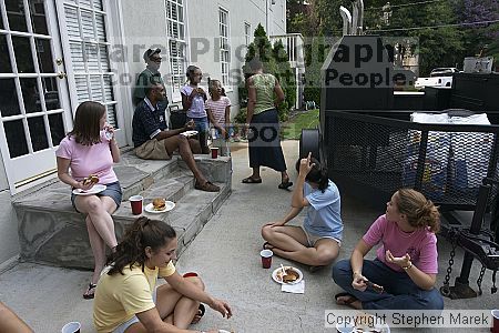 Coach Paul Hewitt grilled hamburgers at AXO Thursday night.  AXO was the winning sorority for the basketball attendance competition.

Filename: crw_0071_std.jpg
Aperture: f/5.6
Shutter Speed: 1/100
Body: Canon EOS DIGITAL REBEL
Lens: Sigma 15-30mm f/3.5-4.5 EX Aspherical DG DF