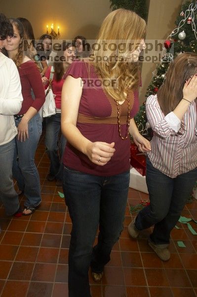 Emily Skipper dancing at the Alpha Delta Pi Christmas party, Sunday, December 10, 2006.

Filename: SRM_20061210_1821421.jpg
Aperture: f/5.0
Shutter Speed: 1/100
Body: Canon EOS 20D
Lens: Canon EF-S 18-55mm f/3.5-5.6