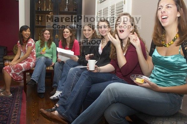 Allison Heather, Ashley Younger, Megan Watson, Ashley Marz, Kathlyn Parr, Meredith Beene, and Jessica Liu (from the right) singing carols at the Alpha Delta Pi Christmas party, Sunday, December 10, 2006.

Filename: SRM_20061210_1853428.jpg
Aperture: f/7.1
Shutter Speed: 1/100
Body: Canon EOS 20D
Lens: Canon EF-S 18-55mm f/3.5-5.6