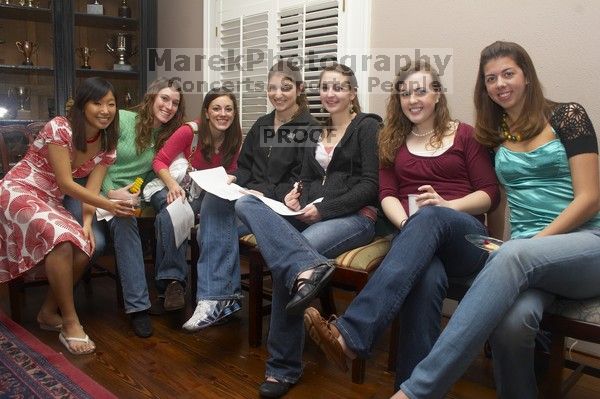 Allison Heather, Ashley Younger, Megan Watson, Ashley Marz, Kathlyn Parr, Meredith Beene, and Jessica Liu (from the right) singing carols at the Alpha Delta Pi Christmas party, Sunday, December 10, 2006.

Filename: SRM_20061210_1854309.jpg
Aperture: f/7.1
Shutter Speed: 1/100
Body: Canon EOS 20D
Lens: Canon EF-S 18-55mm f/3.5-5.6