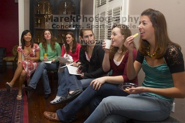 Allison Heather, Ashley Younger, Megan Watson, Ashley Marz, Kathlyn Parr, Meredith Beene, and Jessica Liu (from the right) singing carols at the Alpha Delta Pi Christmas party, Sunday, December 10, 2006.

Filename: SRM_20061210_1854380.jpg
Aperture: f/7.1
Shutter Speed: 1/100
Body: Canon EOS 20D
Lens: Canon EF-S 18-55mm f/3.5-5.6