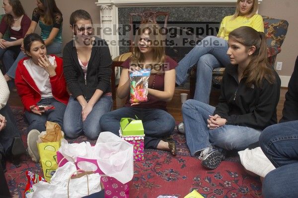 Reem Hafez, Megan Watson, Emily Skipper, Ashley Marz, and Caitlin Miller (from left) opening gifts at the Alpha Delta Pi Christmas party, Sunday, December 10, 2006.

Filename: SRM_20061210_1900547.jpg
Aperture: f/7.1
Shutter Speed: 1/100
Body: Canon EOS 20D
Lens: Canon EF-S 18-55mm f/3.5-5.6