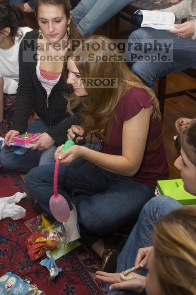 Megan Watson watches as Emily Skipper pumps up another baloon at the Alpha Delta Pi Christmas party, Sunday, December 10, 2006.

Filename: SRM_20061210_1909300.jpg
Aperture: f/7.1
Shutter Speed: 1/100
Body: Canon EOS 20D
Lens: Canon EF-S 18-55mm f/3.5-5.6