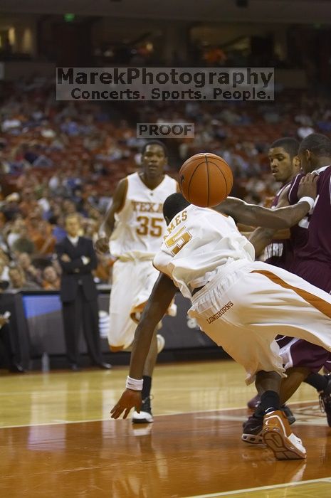 Forward Damion James, #5.  The longhorns defeated the Texas Southern University (TSU) Tigers 90-50 Tuesday night.

Filename: SRM_20061128_2023089.jpg
Aperture: f/2.8
Shutter Speed: 1/640
Body: Canon EOS-1D Mark II
Lens: Canon EF 80-200mm f/2.8 L