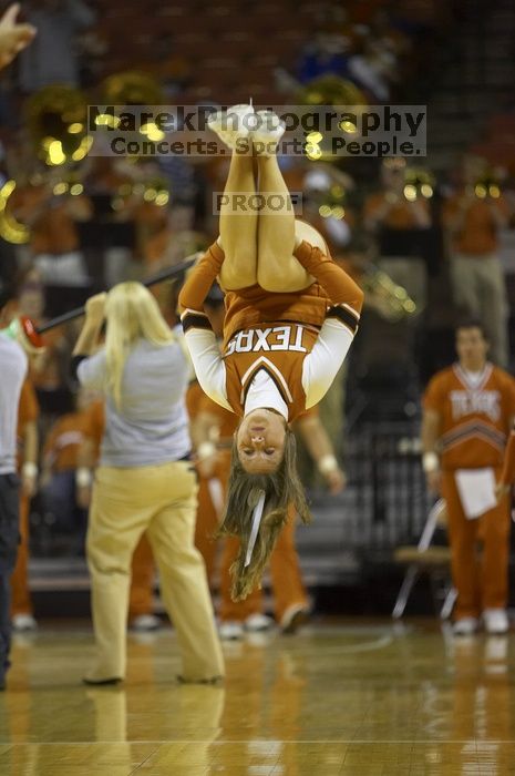 The longhorns defeated the Texas Southern University (TSU) Tigers 90-50 Tuesday night.

Filename: SRM_20061128_2024200.jpg
Aperture: f/2.8
Shutter Speed: 1/640
Body: Canon EOS-1D Mark II
Lens: Canon EF 80-200mm f/2.8 L