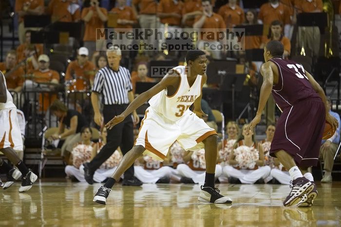 The longhorns defeated the Texas Southern University (TSU) Tigers 90-50 Tuesday night.

Filename: SRM_20061128_2036429.jpg
Aperture: f/2.8
Shutter Speed: 1/640
Body: Canon EOS-1D Mark II
Lens: Canon EF 80-200mm f/2.8 L