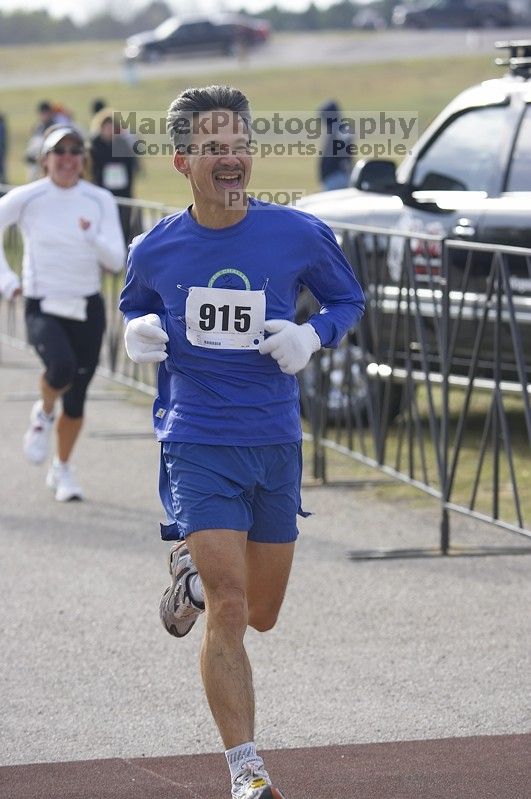 Decker Challenge 20K 2006 road race.

Filename: SRM_20061203_0945040.jpg
Aperture: f/4.0
Shutter Speed: 1/640
Body: Canon EOS-1D Mark II
Lens: Canon EF 80-200mm f/2.8 L