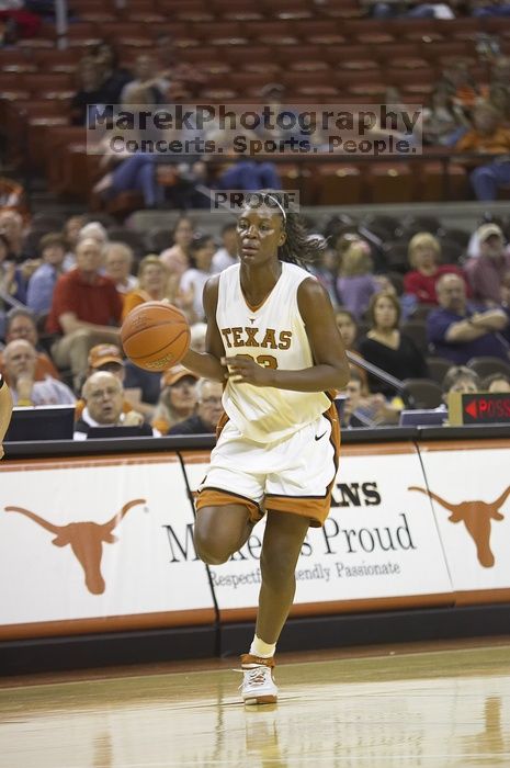 Forward Tiffany Jackson, #33.  The lady longhorns defeated the Oral Roberts University's (ORU) Golden Eagles 79-40 Saturday night.

Filename: SRM_20061125_1329025.jpg
Aperture: f/2.8
Shutter Speed: 1/400
Body: Canon EOS-1D Mark II
Lens: Canon EF 80-200mm f/2.8 L