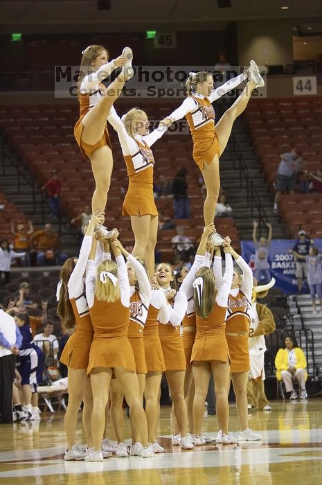 The lady longhorns defeated the Oral Roberts University's (ORU) Golden Eagles 79-40 Saturday night.

Filename: SRM_20061125_1330582.jpg
Aperture: f/2.8
Shutter Speed: 1/400
Body: Canon EOS-1D Mark II
Lens: Canon EF 80-200mm f/2.8 L