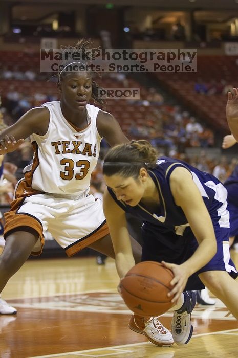 Forward Tiffany Jackson, #33.  The lady longhorns defeated the Oral Roberts University's (ORU) Golden Eagles 79-40 Saturday night.

Filename: SRM_20061125_1333185.jpg
Aperture: f/2.8
Shutter Speed: 1/400
Body: Canon EOS-1D Mark II
Lens: Canon EF 80-200mm f/2.8 L