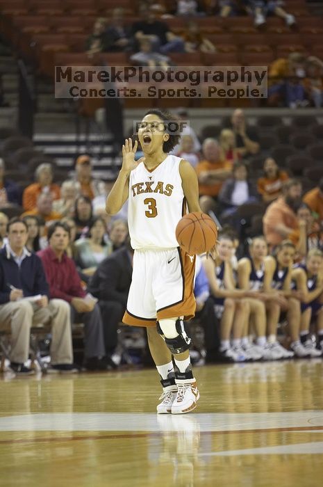 Guard Carla Cortijo, #3.  The lady longhorns defeated the Oral Roberts University's (ORU) Golden Eagles 79-40 Saturday night.

Filename: SRM_20061125_1334362.jpg
Aperture: f/2.8
Shutter Speed: 1/400
Body: Canon EOS-1D Mark II
Lens: Canon EF 80-200mm f/2.8 L