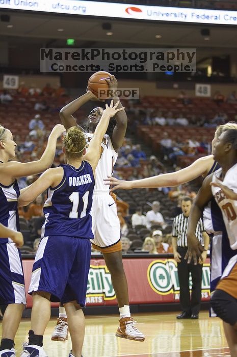 Forward Tiffany Jackson, #33.  The lady longhorns defeated the Oral Roberts University's (ORU) Golden Eagles 79-40 Saturday night.

Filename: SRM_20061125_1339208.jpg
Aperture: f/2.8
Shutter Speed: 1/400
Body: Canon EOS-1D Mark II
Lens: Canon EF 80-200mm f/2.8 L