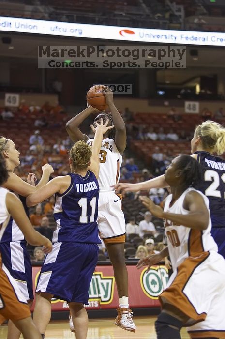 Forward Tiffany Jackson, #33.  The lady longhorns defeated the Oral Roberts University's (ORU) Golden Eagles 79-40 Saturday night.

Filename: SRM_20061125_1339229.jpg
Aperture: f/2.8
Shutter Speed: 1/400
Body: Canon EOS-1D Mark II
Lens: Canon EF 80-200mm f/2.8 L