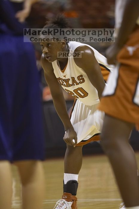 Guard Erneisha Bailey, #20.  The lady longhorns defeated the Oral Roberts University's (ORU) Golden Eagles 79-40 Saturday night.

Filename: SRM_20061125_1350386.jpg
Aperture: f/2.8
Shutter Speed: 1/400
Body: Canon EOS-1D Mark II
Lens: Canon EF 80-200mm f/2.8 L