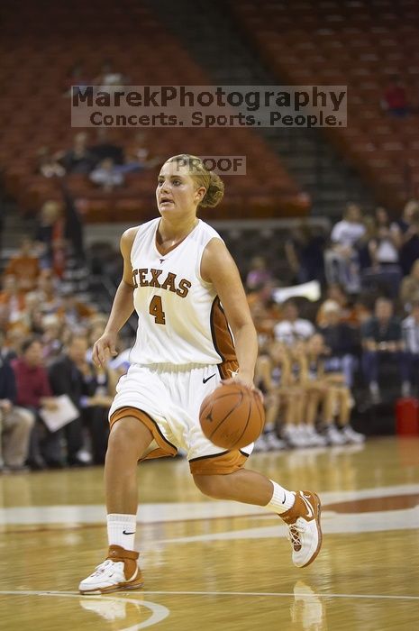 Guard Erika Arriaran, #4.  The lady longhorns defeated the Oral Roberts University's (ORU) Golden Eagles 79-40 Saturday night.

Filename: SRM_20061125_1354163.jpg
Aperture: f/2.8
Shutter Speed: 1/400
Body: Canon EOS-1D Mark II
Lens: Canon EF 80-200mm f/2.8 L