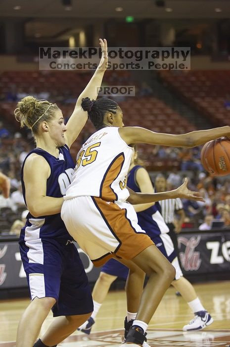 Forward Ashley Lindsey, #35.  The lady longhorns defeated the Oral Roberts University's (ORU) Golden Eagles 79-40 Saturday night.

Filename: SRM_20061125_1357102.jpg
Aperture: f/2.8
Shutter Speed: 1/400
Body: Canon EOS-1D Mark II
Lens: Canon EF 80-200mm f/2.8 L