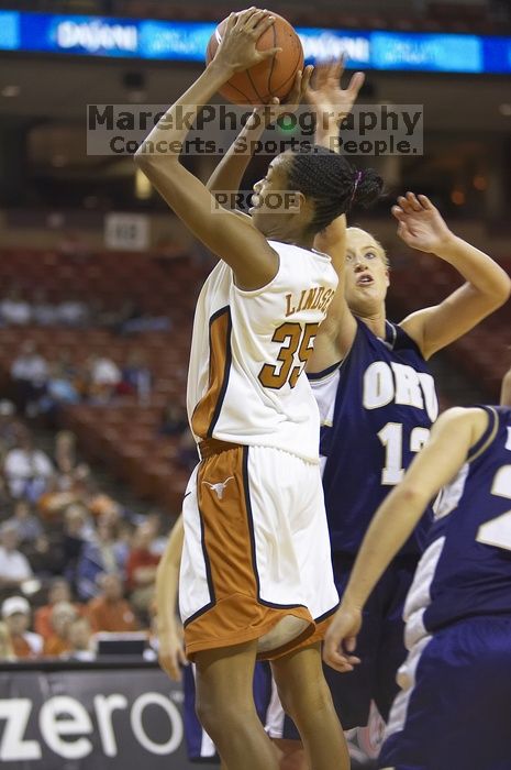 Forward Ashley Lindsey, #35.  The lady longhorns defeated the Oral Roberts University's (ORU) Golden Eagles 79-40 Saturday night.

Filename: SRM_20061125_1358264.jpg
Aperture: f/2.8
Shutter Speed: 1/400
Body: Canon EOS-1D Mark II
Lens: Canon EF 80-200mm f/2.8 L