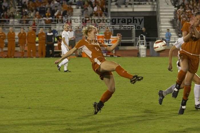 Kelsey Carpenter, #13.  The lady longhorns beat Texas A&M 1-0 in soccer Friday night.

Filename: SRM_20061027_2009344.jpg
Aperture: f/4.0
Shutter Speed: 1/800
Body: Canon EOS 20D
Lens: Canon EF 80-200mm f/2.8 L