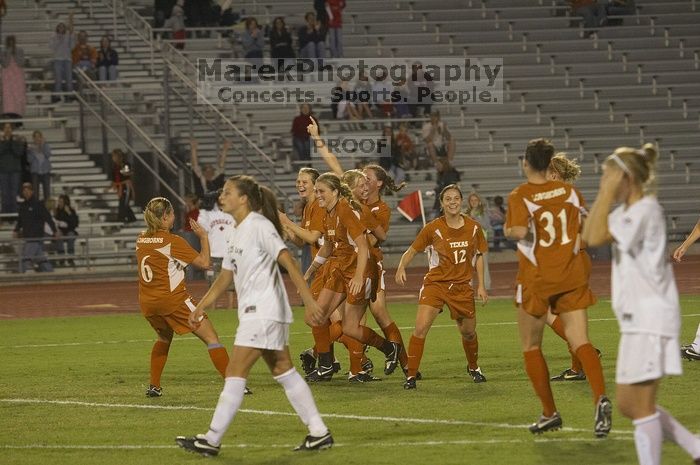 The lady longhorns beat Texas A&M 1-0 in soccer Friday night.

Filename: SRM_20061027_2037501.jpg
Aperture: f/4.0
Shutter Speed: 1/800
Body: Canon EOS 20D
Lens: Canon EF 80-200mm f/2.8 L