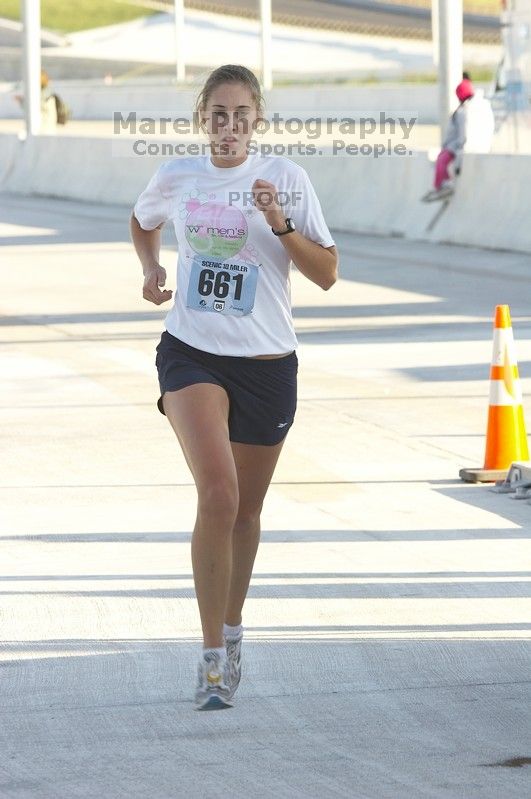 Nora Colligan, bib #661, placed second for the women with a time of 1:03:50 at The Girl Scout Scenic 10 Miler road race, Sunday, October 22, 2006.

Filename: SRM_20061022_0858380.jpg
Aperture: f/7.1
Shutter Speed: 1/250
Body: Canon EOS 20D
Lens: Canon EF 80-200mm f/2.8 L