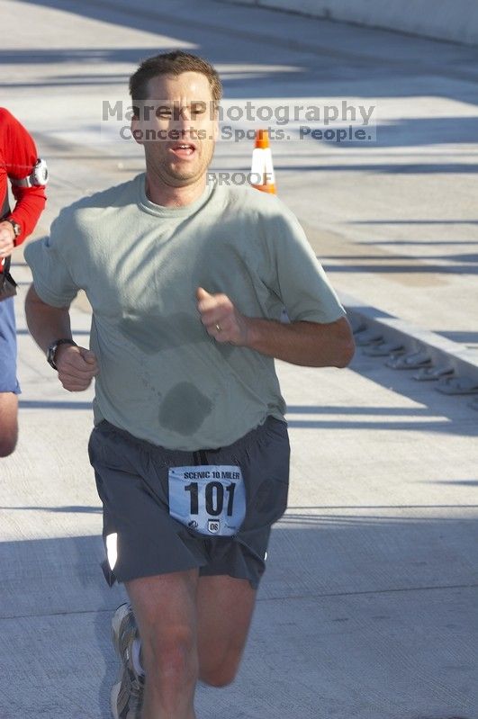 Mark Lowther, bib #101, with a time of 1:18:00 at The Girl Scout Scenic 10 Miler road race, Sunday, October 22, 2006.

Filename: SRM_20061022_0913324.jpg
Aperture: f/9.0
Shutter Speed: 1/250
Body: Canon EOS 20D
Lens: Canon EF 80-200mm f/2.8 L