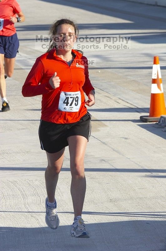 Beth Brewster running The Girl Scout Scenic 10 Miler road race, Sunday, October 22, 2006.

Filename: SRM_20061022_0914407.jpg
Aperture: f/10.0
Shutter Speed: 1/250
Body: Canon EOS 20D
Lens: Canon EF 80-200mm f/2.8 L