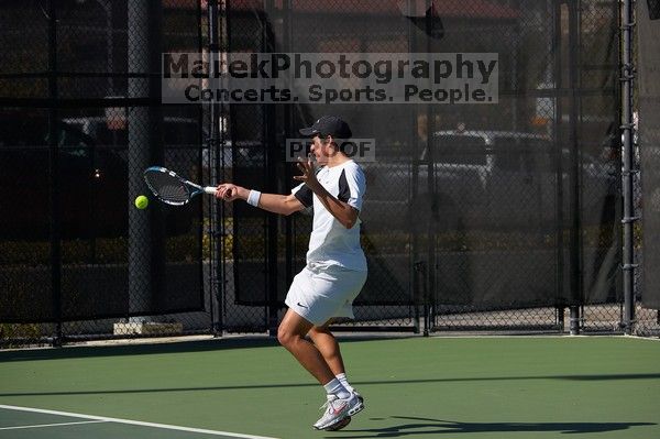 Luis Diaz Barriga.  The University of Texas (UT) men's tennis team defeated Georgia Tech (GT) Saturday, February 24, 2007..

Filename: SRM_20070224_1428268.jpg
Aperture: f/4.0
Shutter Speed: 1/8000
Body: Canon EOS-1D Mark II
Lens: Canon EF 80-200mm f/2.8 L