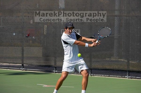 Luis Diaz Barriga.  The University of Texas (UT) men's tennis team defeated Georgia Tech (GT) Saturday, February 24, 2007..

Filename: SRM_20070224_1428300.jpg
Aperture: f/4.0
Shutter Speed: 1/8000
Body: Canon EOS-1D Mark II
Lens: Canon EF 80-200mm f/2.8 L