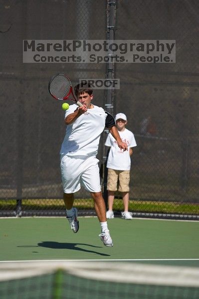 Milan Mihailovic (UT) defeated Jordan DeLass (GT) 6-4, 6-4.  The University of Texas (UT) men's tennis team defeated Georgia Tech (GT) Saturday, February 24, 2007..

Filename: SRM_20070224_1440043.jpg
Aperture: f/4.0
Shutter Speed: 1/8000
Body: Canon EOS-1D Mark II
Lens: Canon EF 80-200mm f/2.8 L