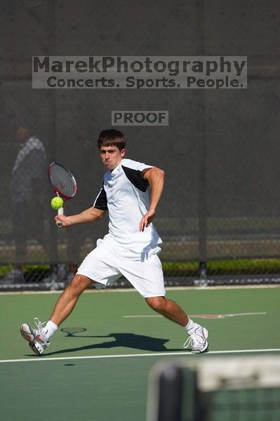 Milan Mihailovic (UT) defeated Jordan DeLass (GT) 6-4, 6-4.  The University of Texas (UT) men's tennis team defeated Georgia Tech (GT) Saturday, February 24, 2007..

Filename: SRM_20070224_1440064.jpg
Aperture: f/4.0
Shutter Speed: 1/8000
Body: Canon EOS-1D Mark II
Lens: Canon EF 80-200mm f/2.8 L