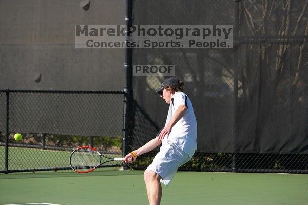 Rook Schellenberg (UT) defeated George Gvelesiani (GT) 6-3, 7-6.  The University of Texas (UT) men's tennis team defeated Georgia Tech (GT) Saturday, February 24, 2007..

Filename: SRM_20070224_1513122.jpg
Aperture: f/4.0
Shutter Speed: 1/4000
Body: Canon EOS-1D Mark II
Lens: Canon EF 80-200mm f/2.8 L