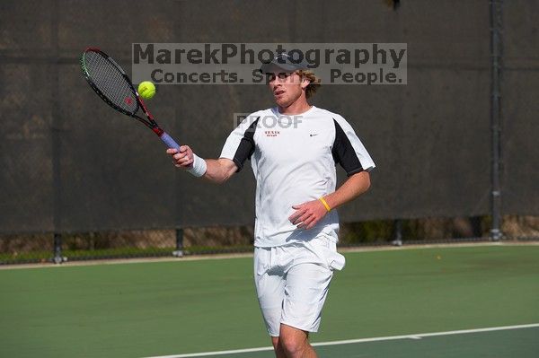 Rook Schellenberg (UT) defeated George Gvelesiani (GT) 6-3, 7-6.  The University of Texas (UT) men's tennis team defeated Georgia Tech (GT) Saturday, February 24, 2007..

Filename: SRM_20070224_1514328.jpg
Aperture: f/4.0
Shutter Speed: 1/4000
Body: Canon EOS-1D Mark II
Lens: Canon EF 80-200mm f/2.8 L