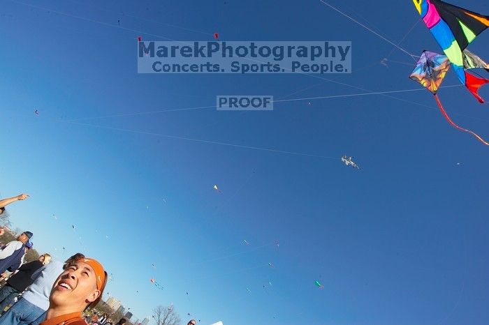 Chris Lam attempts to fly his UT kite at the 79th annual Zilker Park Kite Festival, Sunday, March 4, 2007.

Filename: SRM_20070304_1532187.jpg
Aperture: f/11.0
Shutter Speed: 1/250
Body: Canon EOS-1D Mark II
Lens: Sigma 15-30mm f/3.5-4.5 EX Aspherical DG DF