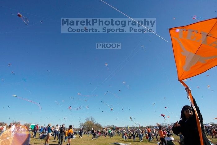 Madhav Tadikonda, class of 1997, and Anjali Patel, class of 1999, fly a UT kite at the 79th annual Zilker Park Kite Festival, Sunday, March 4, 2007.

Filename: SRM_20070304_1537364.jpg
Aperture: f/11.0
Shutter Speed: 1/250
Body: Canon EOS-1D Mark II
Lens: Sigma 15-30mm f/3.5-4.5 EX Aspherical DG DF