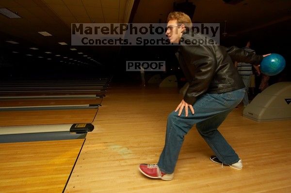 Blake Lindell bowling.  Alpha Xi Delta held a sock hop themed date night at the Austin 300 bowling alley, Thursday night, March 29, 2007.

Filename: SRM_20070329_2042545.jpg
Aperture: f/8.0
Shutter Speed: 1/200
Body: Canon EOS-1D Mark II
Lens: Sigma 15-30mm f/3.5-4.5 EX Aspherical DG DF